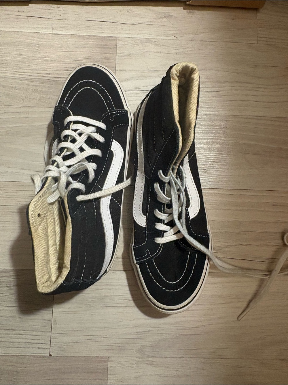 Vans Black High-Top Skate Sneakers with White Stripe